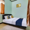Отель OYO 91298 Rumah Cantik Homestay Syariah, фото 3