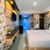 Отель Simple And Cozy Studio Tamansari Skylounge Makassar Apartment, фото 2