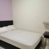 Отель Wisma Lusya near GOR Satria RedPartner, фото 5