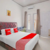 Отель Wisma Bambu Syariah by  OYO Rooms, фото 20