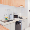 Отель Comfort Stay 2Br At Sky House Bsd Apartment Near Aeon, фото 11