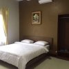Отель Villa Fahim 1 Puncak 4 Bedroom, фото 5