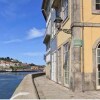 Отель Oporto Home Boutique Apartments в Порту