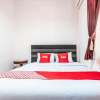 Отель Kost Kuningan Executive Boading House by OYO Rooms, фото 13