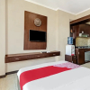 Отель OYO 90465 Ars Ira Property The Suites Metro, фото 7