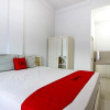 Отель RedDoorz Syariah At Griya Izzara Guest House, фото 4