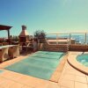 Отель Luxury 5 star villa with amazing sea view and heated pool, фото 13