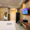 Отель Modern Studio Room Apartment At Tamansari Skylounge Makassar, фото 1