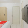 Отель OYO 1242 Aeropolis Apartment, фото 5