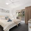 Отель Lux Apartment Cairns - 9 Pools BBQ Gym, фото 3