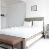 Отель Spacious And Modern Studio Room Apartment At Grand Asia Afrika, фото 2
