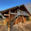 Отель Woodpecker Log Cabin with hot tub, pizza oven bbq entertainment area, lakeside with private fishing , фото 7