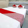 Отель OYO 91202 Family Guest House Syariah, фото 15