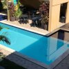 Отель Apartamento com Piscina a Beira Mar, фото 29