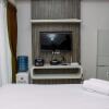 Отель Homey And Simple Studio Apartment At Taman Melati Margonda, фото 11