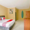 Отель OYO 867 Bettah Coba Homestay, фото 2
