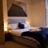 Отель 3 Bedroom City Centre Apartment в Эдинбурге