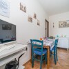 Отель Appartamento Villa da 4 Fino a 5 Persone Giardino, фото 8
