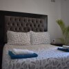 Отель Brightcastle Harare City Apartments в Хараре