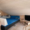 Отель 12 Person Holiday Home in Laeso, фото 7
