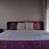 Отель OYO 90076 Guesthouse Graha Pande Residence, фото 5