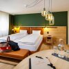 Отель Hirschen Guesthouse - Village Hotel, фото 5