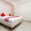 Отель OYO Flagship 22705 Triveni Inn, фото 14