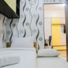 Отель Homey 2br Mutiara Bekasi Apartment, фото 3