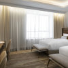 Отель Al Jaddaf Rotana Suite Hotel, фото 13
