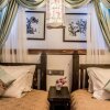 Отель Lijiang Xiang He Garden Boutique Inn, фото 3