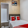 Отель OYO 90940 Guesthouse Colombus G12, фото 13