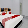 Отель OYO 91203 Naufal Residence Syariah, фото 15