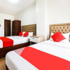 Отель OYO 256 Sakura Suites, фото 7