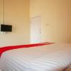 Отель OYO 2202 Delima Guest House Syariah, фото 4