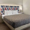 Отель Days Inn & Suites by Wyndham Peachtree Corners/Norcross в Норкроссе