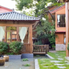 Отель LiJiang Cibei Guesthouse, фото 1