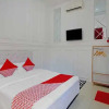 Отель OYO 90546 Aura Syariah Homestay, фото 4