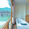 Отель Floral Hotel Fenghuang Huercaowu, фото 8