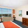 Отель Ramada by Wyndham Kissimmee Gateway, фото 4