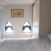 Отель Modern 1 Bedroom Flat in Converted Church, фото 4