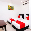 Отель OYO 718 MR J Hotel Wakaf Che Yeh 1, фото 11
