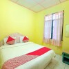 Отель OYO 92503 Penginapan & Villa Sirait, фото 6