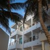 Отель Capital O Hotel Arena Beach Club в Пуэрто-Морелосе