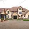 Отель The Cottage Guest House Gigiri, фото 1