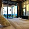 Отель Sunset Seaview Beach Villas & Spa Suites at Nexus Karambunai, фото 8