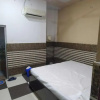 Отель OYO 701211 Rock Star Hotel & Rooms, фото 3