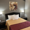 Отель Tri-Valley Inn & Suites, фото 1