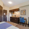 Отель Kindersley All Suites Hotel, фото 15