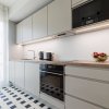 Отель Central apartments, Quiet with Free Parking and AC., фото 7