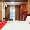 Отель Brickwood Suites by RedDoorz, фото 13